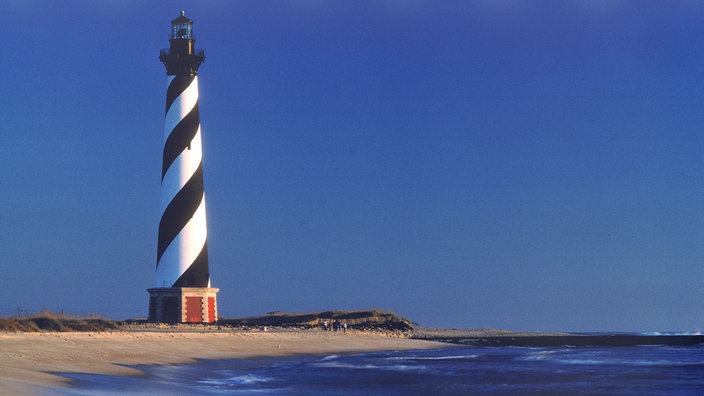 Leuchtturm an einem Strand